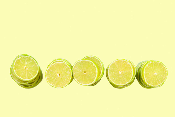 Lime slices isolated on white background. Space for text or desi - Photo, Image