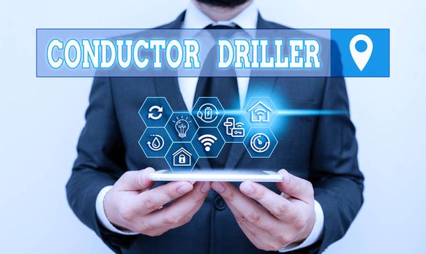 Writing note showing Conductor Driller. Business photo showcasing means of conveying the upflowing drilling fluid. - Photo, Image