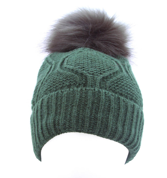 chapéu de inverno de lã verde com um pompom pompom pom isolado no branco
 - Foto, Imagem