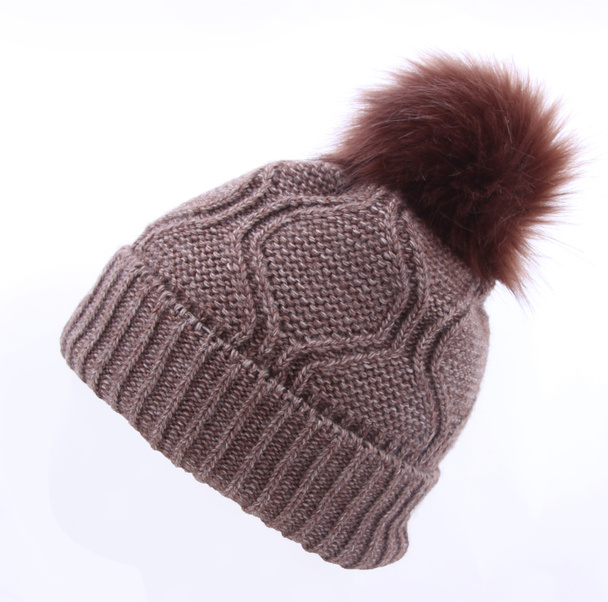 Brown knitted hat on a white background - 写真・画像