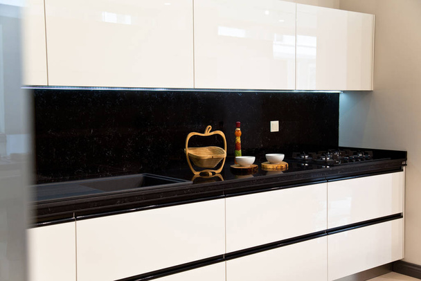 Interior of luxurious modern kitchen white cabinets - Foto, Bild