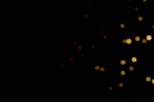 Siyah arkaplanda parlayan ışıklar - Fotoğraf, Görsel