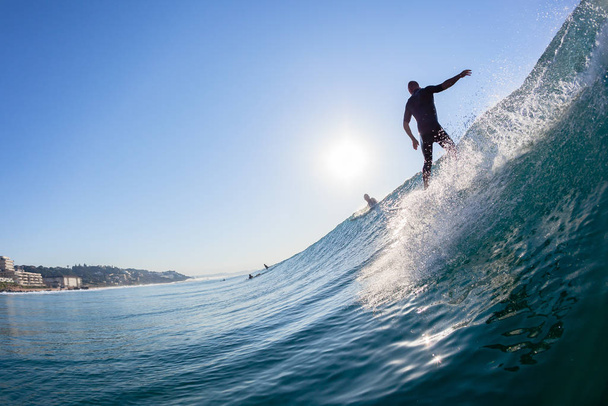 Surfer silhouet surfen golf rit water foto - Foto, afbeelding