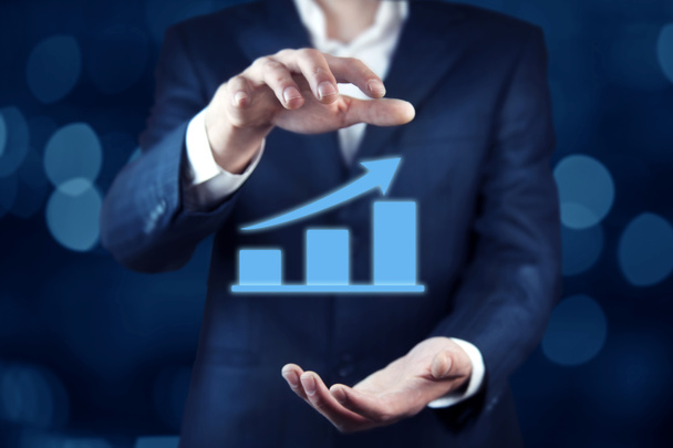 Financial growth chart in man hand - Photo, Image