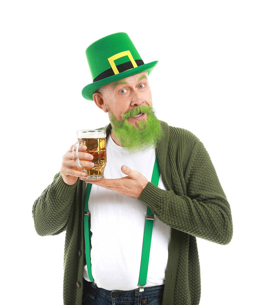 Funny mature man with glass of beer on white background. St. Patrick's Day celebration - Photo, Image