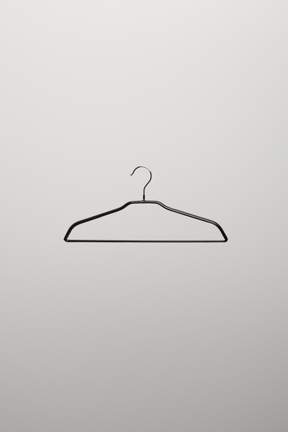 top view of empty hanger on grey background - Photo, Image