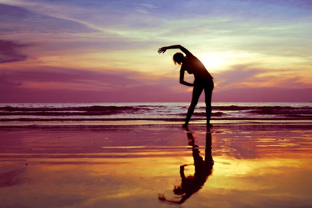 Woman practicing yoga - Фото, изображение