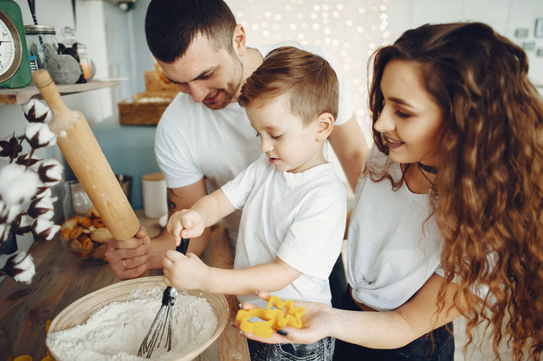 Family with little son in a kitchen - Photo, image