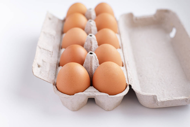 brown chicken eggs in an open tray, side view - Photo, Image