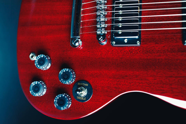 parte de la guitarra roja, vista de cerca
 - Foto, imagen