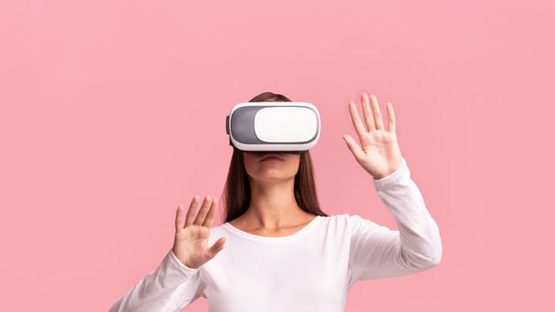 Millennial Girl Using Virtual Reality Headset Over Pink Background, Panorama - 写真・画像