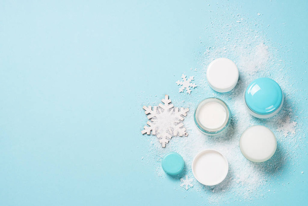 Natural cosmetics for winter on blue. - Foto, Bild