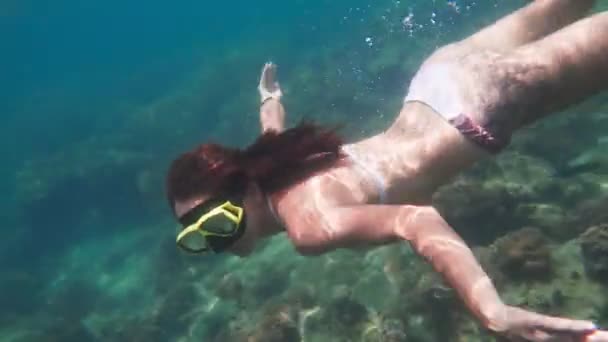 Young woman freediving - 映像、動画