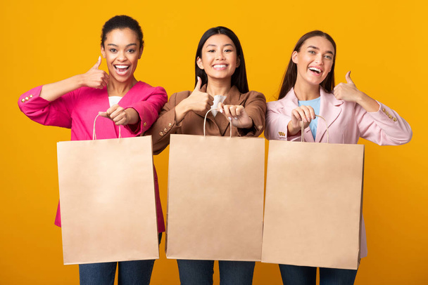 Three Women Showing Blank Shopper Bags Gesturing Thumbs-Up, Studio, Mockup - Photo, Image