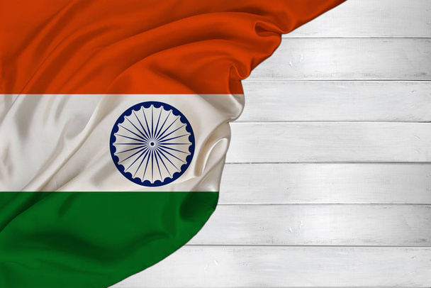 horizontal colored national flag of modern state of india, beautiful silk, white wood background, concept of tourism, economy, politics, emigration, independence day, copy space, template - Фото, зображення