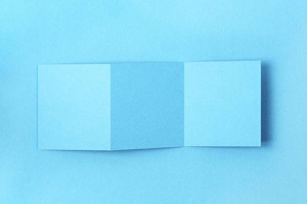 blue folded paper - Φωτογραφία, εικόνα