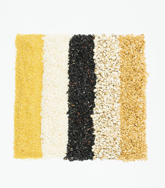 Värikäs raidallinen riviä riisiä
 - Valokuva, kuva