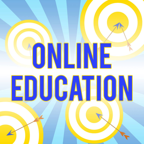 Writing note showing Online Education. Business photo showcasing kind of learning that takes place via the Internet Arrow and round target asymmetrical shape multicolour design. - Photo, Image