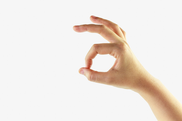 Женский знак руки изолирован на белом фоне - Фото, изображение