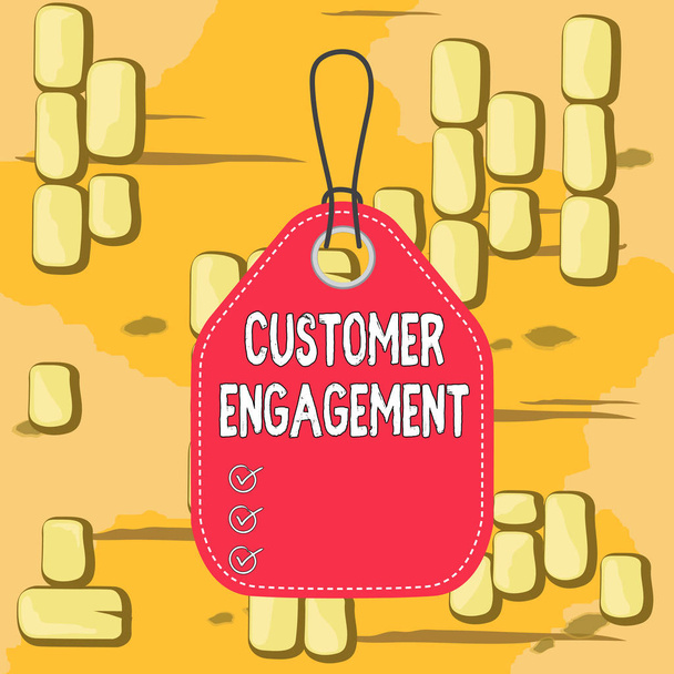 Word writing text Customer Engagement. Business concept for the emotional connection between a customer and a brand Empty tag blank space colorful background label rectangle attached string. - Photo, Image