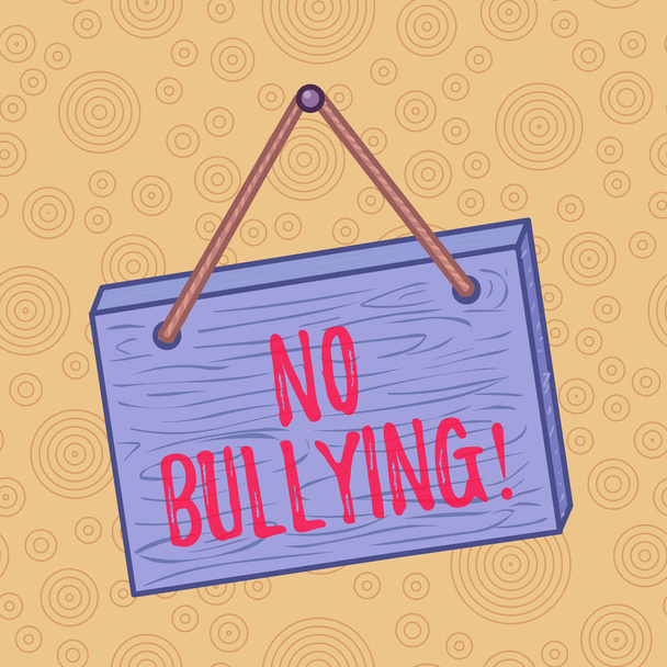 Handwriting text writing No Bullying. Concept meaning stop aggressive behavior among children power imbalance Square rectangle unreal cartoon wood wooden hang down on the coloured wall. - Photo, Image