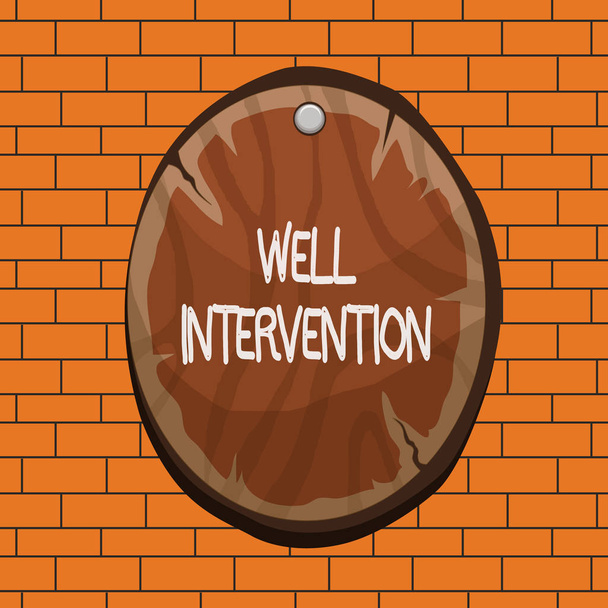 Text sign showing Well Intervention. Conceptual photo work carried out on gas well to alter or analysisage its health Oval plank rounded pinned wooden board circle shaped wood nailed background. - Photo, Image