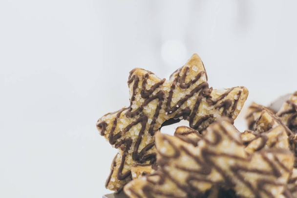 Star muoto evästeen suklaata ja sokeria päälle
 - Valokuva, kuva