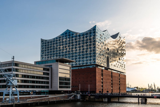 The Elbphilharmonie, concert hall in the port of Hamburg at sunset - Photo, Image