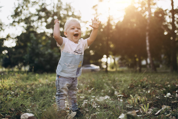 a little blod child walking with amazing smile - Photo, Image
