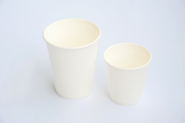Group of white coffee cup made from cup stock paper on white background - Photo, Image