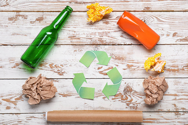Different garbage on wooden background. Recycling concept - Foto, Bild