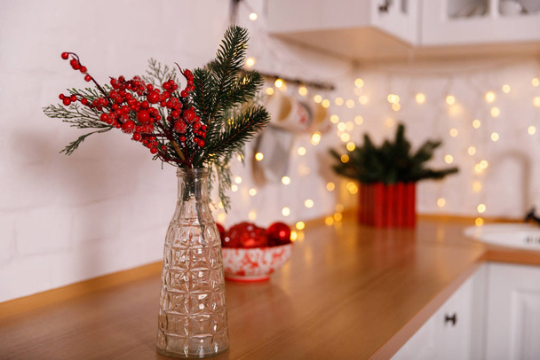 Kitchen decorated for Christmas in red colour - Foto, Imagen