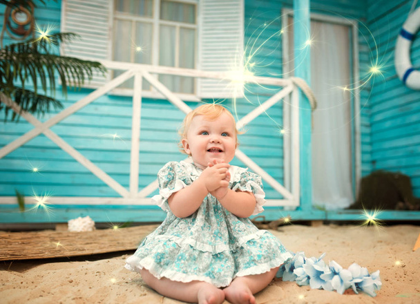 Charming little half-year-old sorceress girl - Fotó, kép