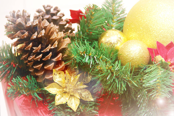 festive multi-colored toys balls, cones, tree branches and decor - Photo, Image
