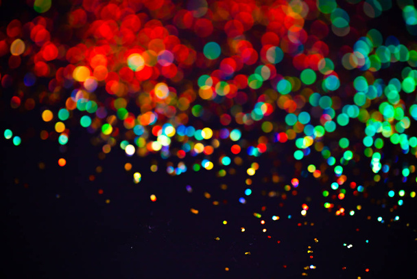 Multicolor glitter raster background. Abstract shimmering red circles on deep purple backdrop. Vibrant bokeh lights effect festive illustration. Overlapping glowing and twinkling spots. - Foto, immagini