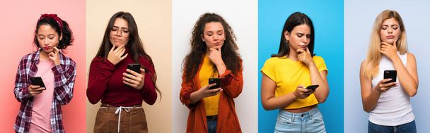 Joukko naisia yli eristäytynyt värikäs tausta ajattelua ja lähettää viestin
 - Valokuva, kuva