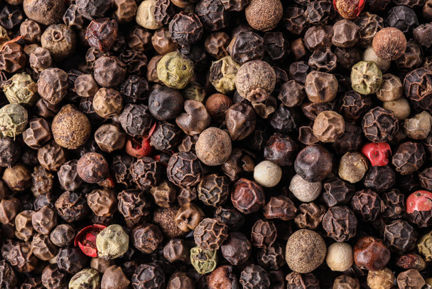 Pepper grains mix as background, top view - Foto, Imagen