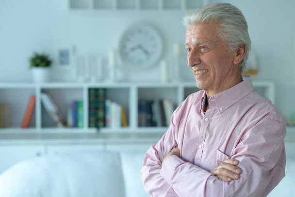 portrait of smiling senior man at home  - Φωτογραφία, εικόνα