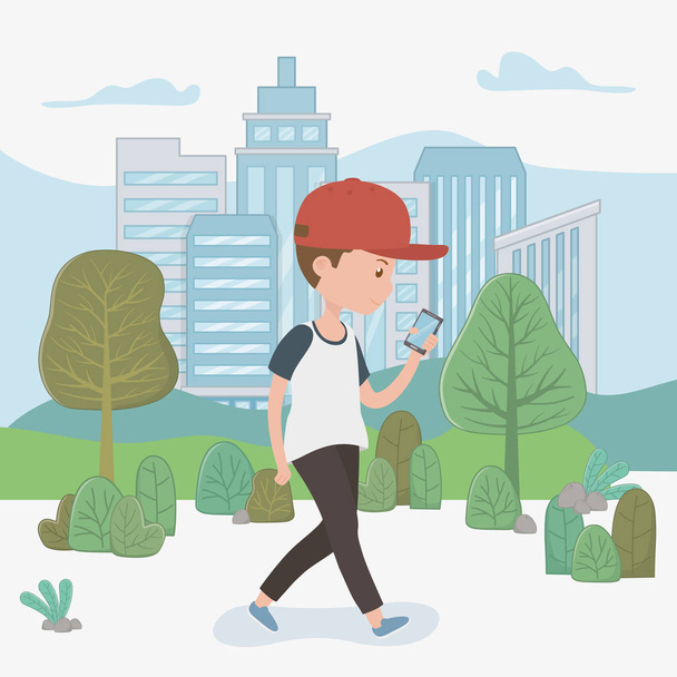 young boy walking using smartphone in the park - Vector, imagen
