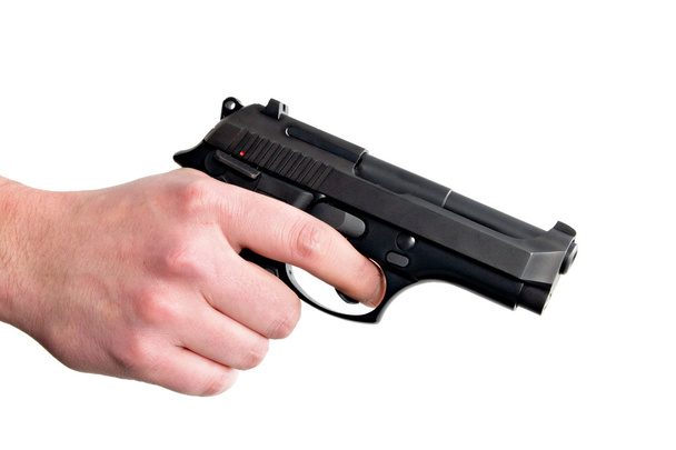 Hand Holding Gun - Foto, immagini