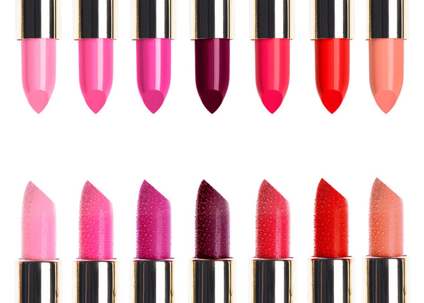 Set of bright lipsticks placed in two lines isolated on white - Fotoğraf, Görsel