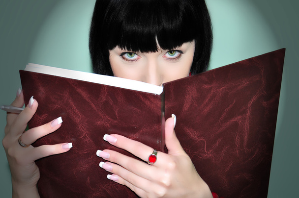 Girl with an open book - 写真・画像