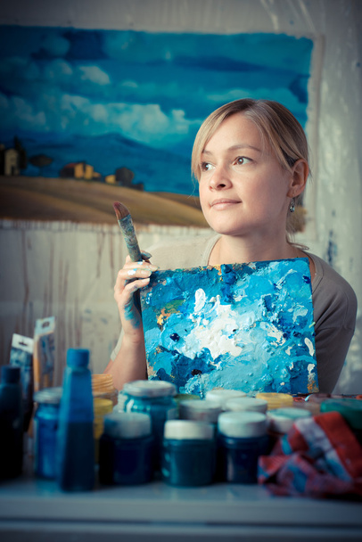 beautiful blonde woman painter - Photo, image