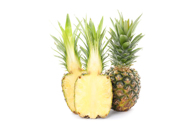 Pineapple and two halves isolated on white background. Juicy fru - Valokuva, kuva