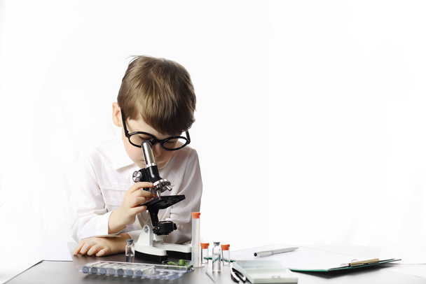 Young scientists chemists. Doctor, laboratory assistant. - Фото, изображение