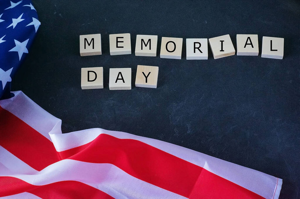 Memorial Day. American flag and the inscription on a black background - Foto, Imagem