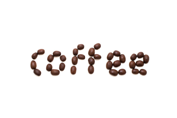 Word coffee created with coffee beans  - Valokuva, kuva