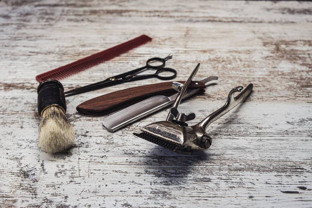 vintage barber tools dangerous razor hairdressing scissors old manual clipper comb shaving brush - Photo, Image