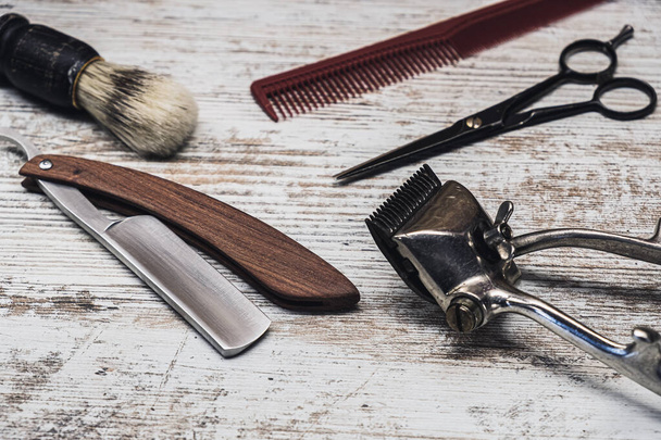 vintage barber tools dangerous razor hairdressing scissors old manual clipper comb shaving brush - Фото, зображення