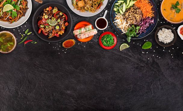 Asian food background with various ingredients on rustic stone background , top view. - 写真・画像